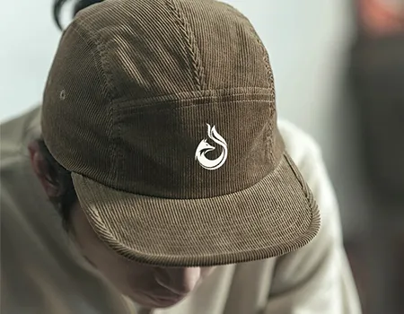 5 panel a person wearing a hat