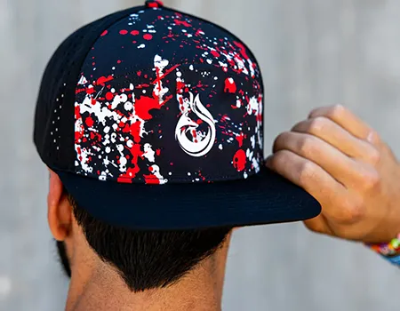a man wearing a dad hat splash color design