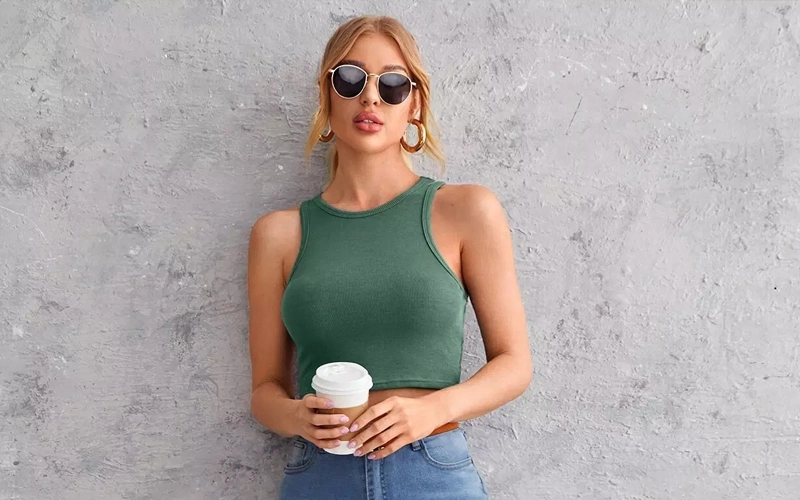 Woman wearing green Cut-Out Tank Top