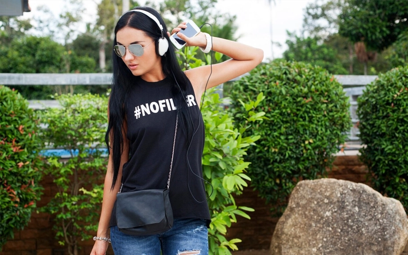 Woman waring a black Flowing Tank Tops