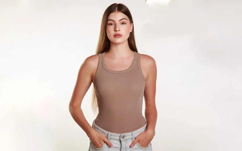 a women wearing brown color Halter T-shirt