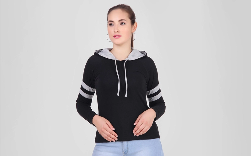 a women wearing black color Hoodie T-shirt with grey stripe