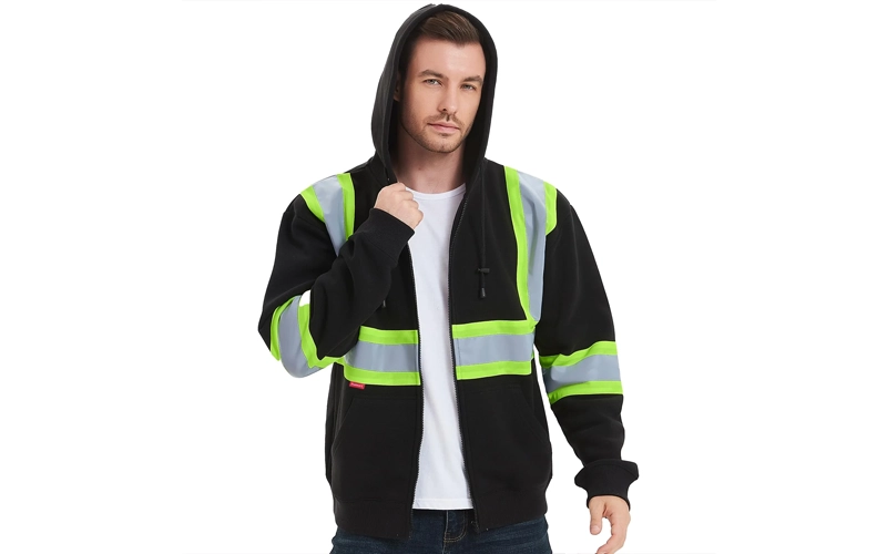 man wearing hoodiw with green and silver reflective zipper