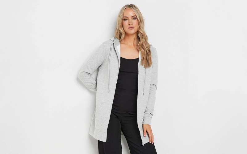 women wearing a gray longline hoodie