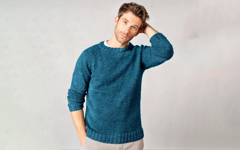 a man wearing zinc color Raglan Sweater