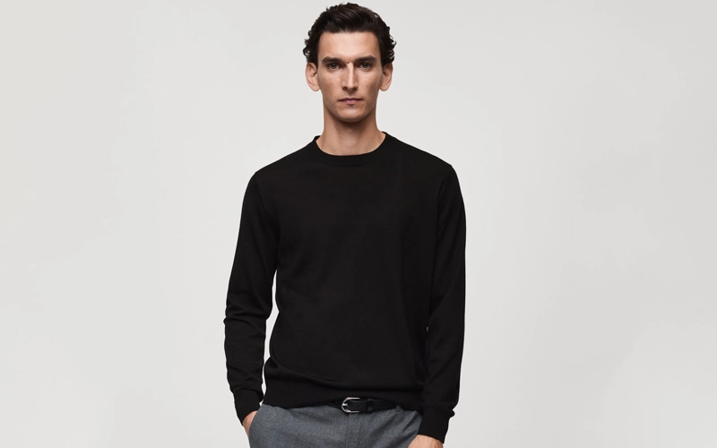 a man wearing black color wool sweater