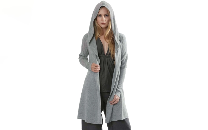 a blonde women wearing a grey color hooded Cardigans.