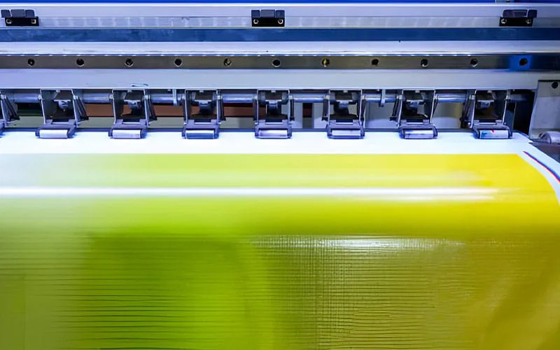 Showcase of a glow-in-the-dark printing process, highlighting the creation of custom designs that glow in low-light conditions, perfect for unique apparel and merchandise.